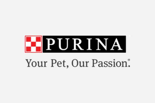 Purina logo with a red and white checkerboard pattern, the word "PURINA" in white on a black background, and the slogan "Your Pet, Our Passion." below in gray text—trusted by veterinarians and animal hospitals everywhere.