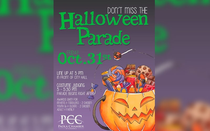 A Halloween parade poster shows a jack-o’-lantern bucket filled with candy and toys. Text details the parade on Friday, Oct. 31, with lineup at 5 PM at City Hall, costume judging, and awards by the Paola Chamber of Commerce.