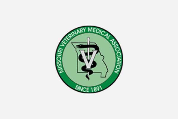 Logo of the Missouri Veterinary Medical Association, featuring a green circle with the outline of Missouri, a veterinary caduceus symbol, and the text "Missouri Veterinary Medical Association Since 1891.